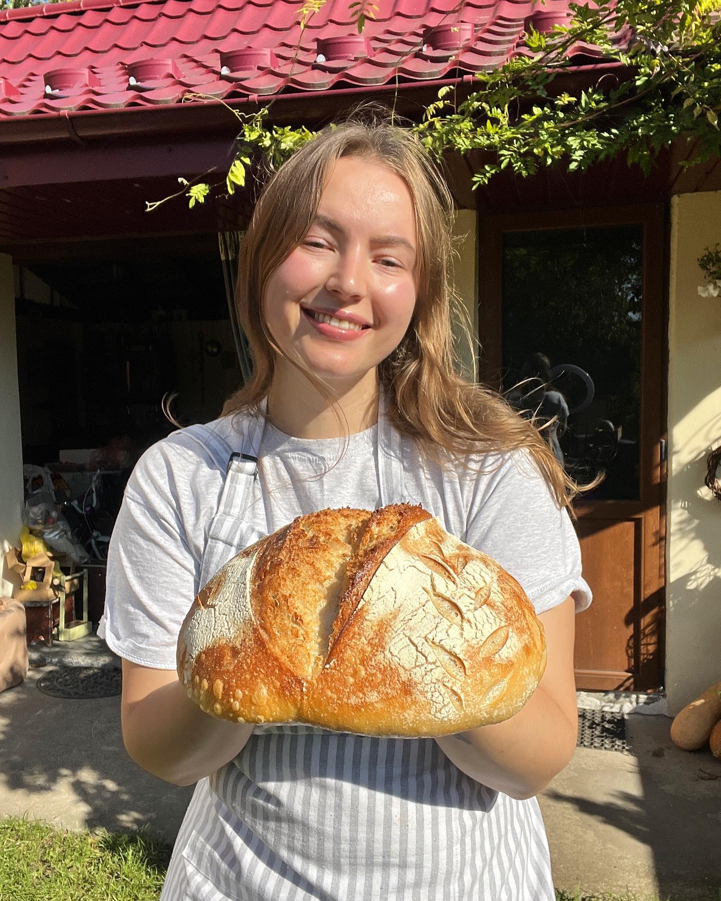 Anny baking fresh sourdough bread
