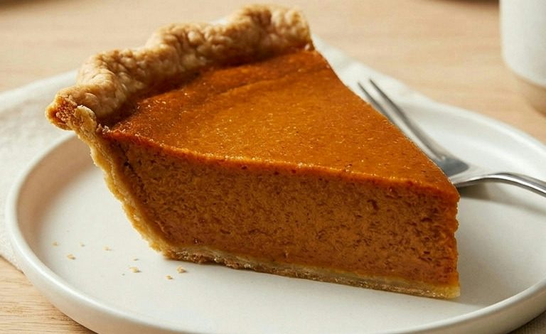 Close-up of The Ultimate Brown Butter & Bourbon Sweet Potato Pie served and ready to eat